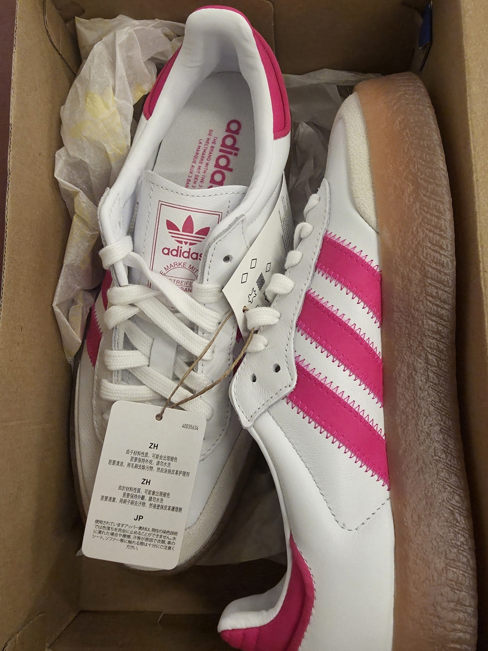 New Adidas Originals Samba OG sneakers in a white and vibrant pink